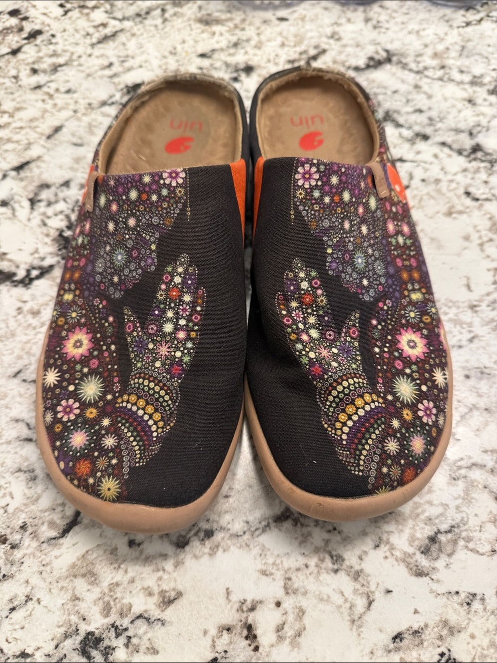 UIN Pray For Goodness Black Floral Mosaic Slip-On Clogs with Orange Accents